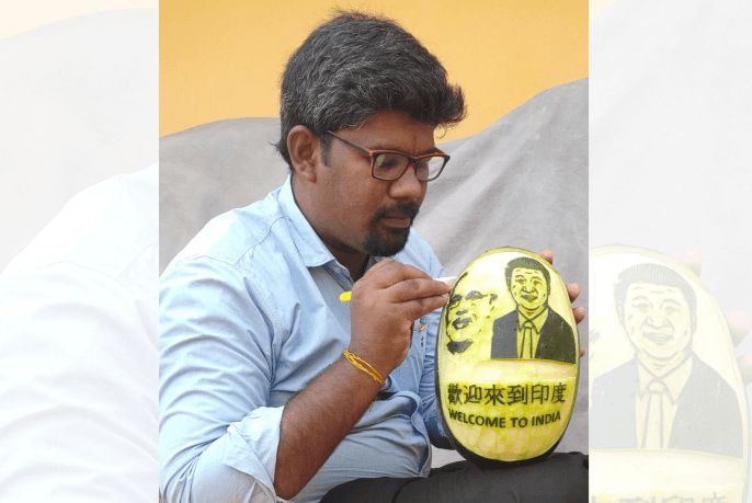 elanchezhian carved out the images of modi xijinping on a waterlemon