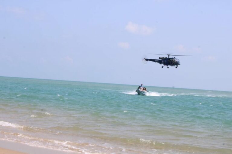 Sri Lankan Navy personnel watching the sea in a helicopter..Rameswaram fishermen in shock!..
