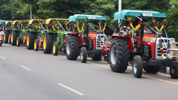 A bank that gives money to farmers to buy tractors!! Happy farmers!!