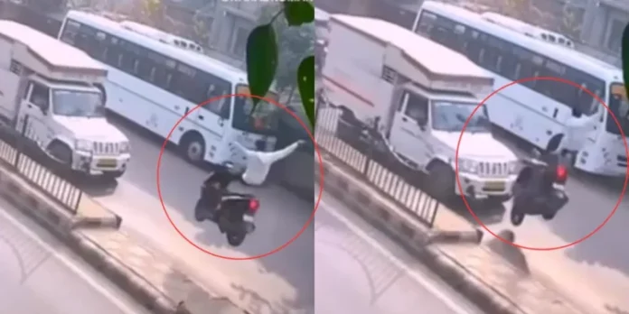 Scooter Rider Fly High in Air After Hitting Divider